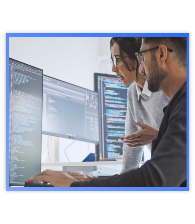 CX Advisory services_Collapsible list man and woman looking at computer code on verticial computer screen